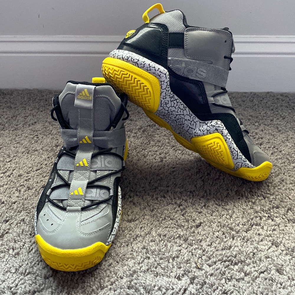Gently used Adidas Grey, Black and Yellow mid top men’s sneakers